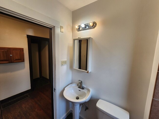 Building Photo - 4 BR home with first-floor living, new roof, and a private-feeling backyard in Lincoln Place