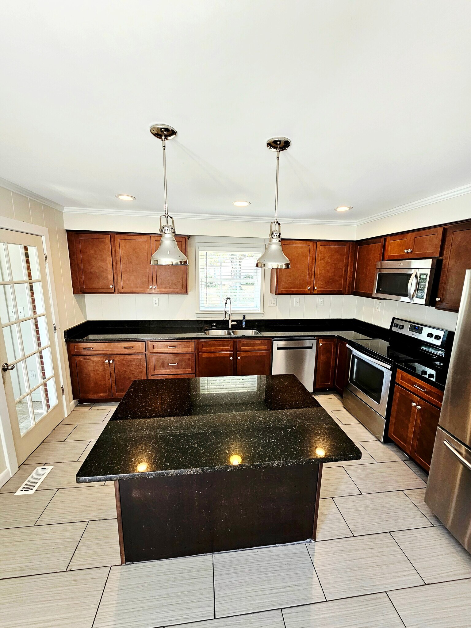 Stainless steel appliances and granite - 4530 Bible Church Rd
