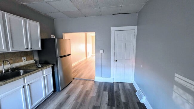 Building Photo - Beautiful Two Bedroom, Plus a Pass Through Room with a Fenced in Rear Patio