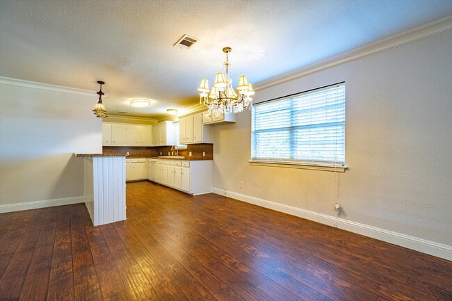 Building Photo - Move in special: $1,000 off your first month with an 18 month lease.