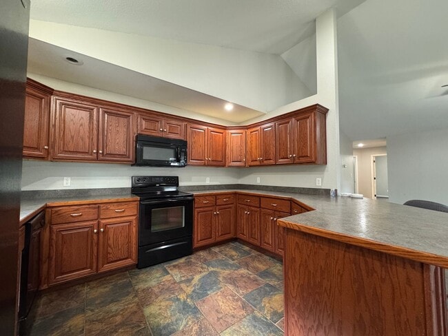 Building Photo - Well Maintained 4 Bedroom with a Privacy F...