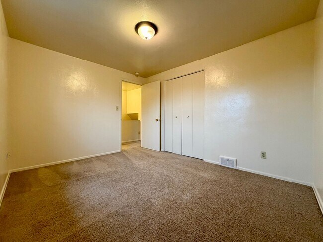 Building Photo - Stunning 2 BR Townhouse with Attached Garage! Central A/C & MORE!! CALL TODAY TO SCHEDULE A TOUR!