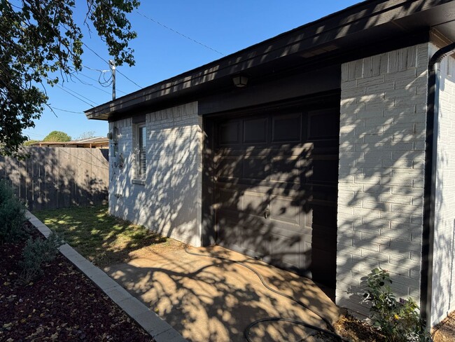 Building Photo - Updated 4-Bedroom Home with Spacious Backy...