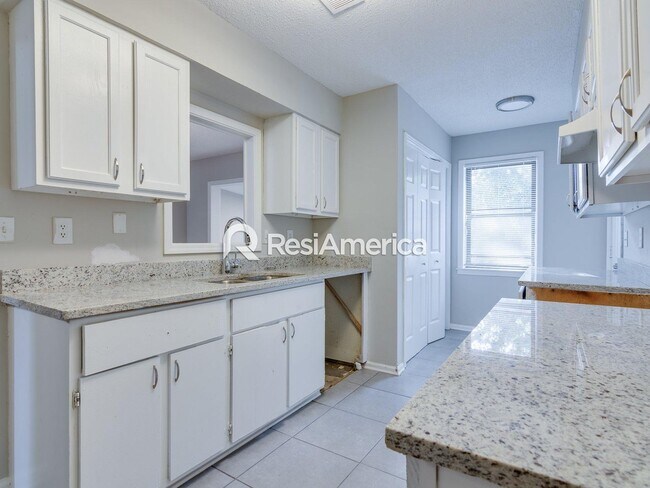 Building Photo - Fully renovated 3BR/2BA with fenced in yard