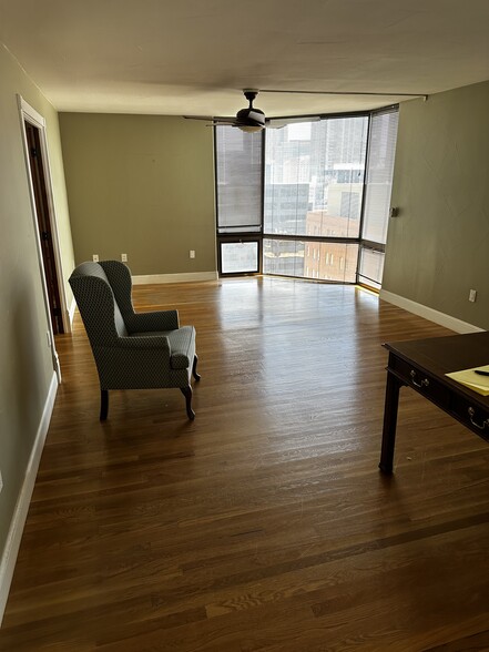 Living Room & Window Looking at the Clocktower on the 16th Street Mall - 1625 Larimer St