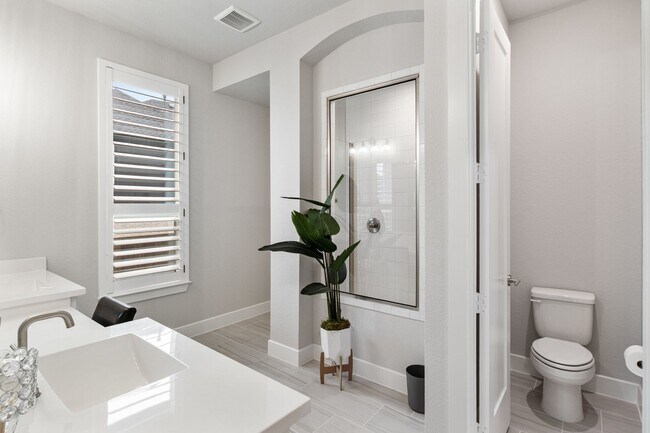 Building Photo - Stunning 4-Bedroom Luxury Residence with Bonus Office in the Prestigious Walsh Community LIKE NEW!