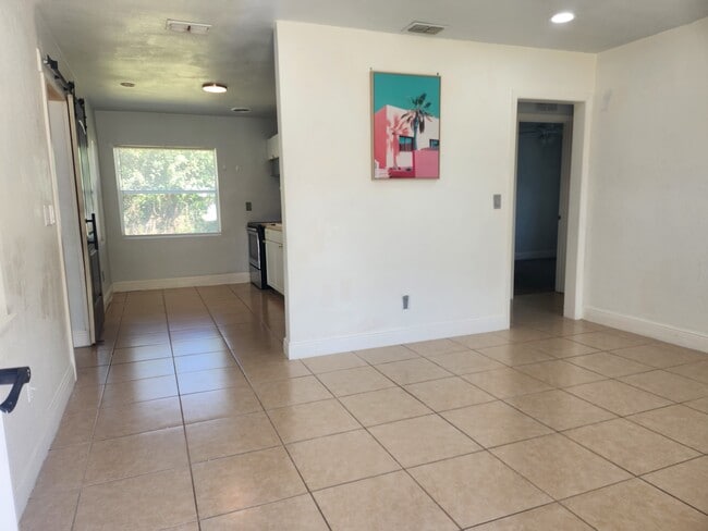 recessed lighting and tiled floors - 1015 Woodland Ave