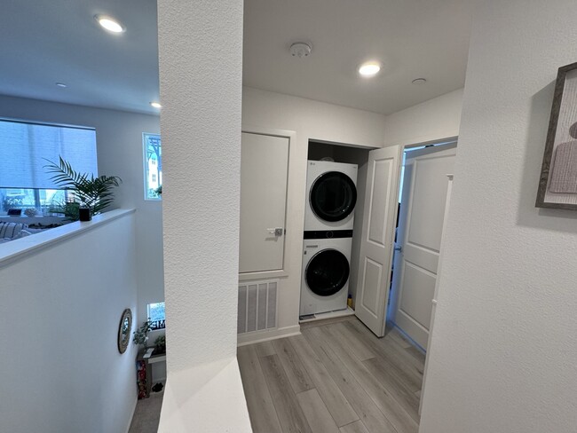 Hallway w/new Washer-Dryer - 10542 Derella Way