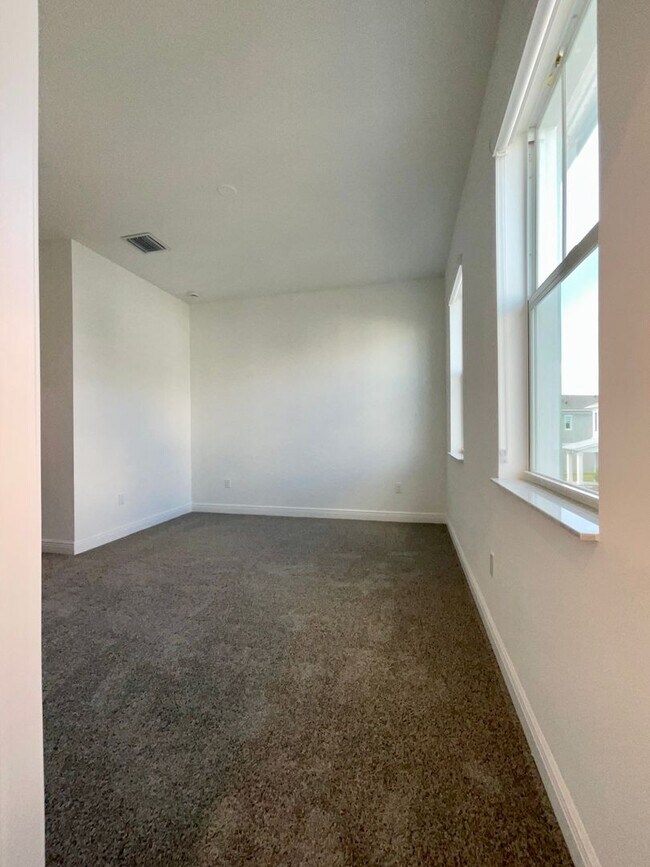 Building Photo - 3/2.5/2 Townhome in Rosette Park at Newfield