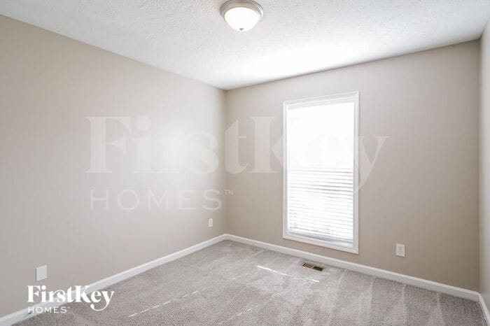 Building Photo - 6009 Pleasant Hill Dr