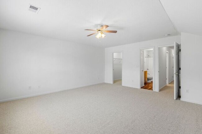 Building Photo - NW Brick Townhome, Granite Counter-Tops, Wood Floors, FP, Garage!