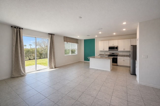 Building Photo - Charming 3-Bed Oasis with Elegance in Haines City!