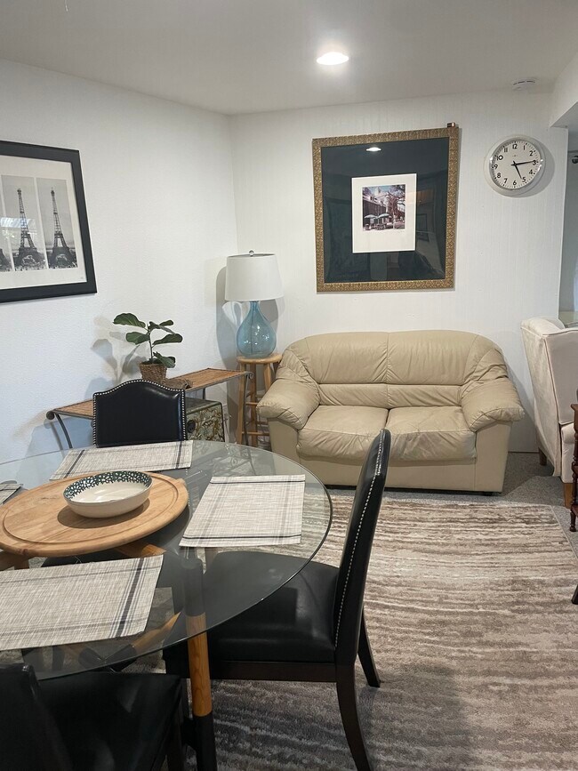 Couch and dining table. - 27 Graceland Dr