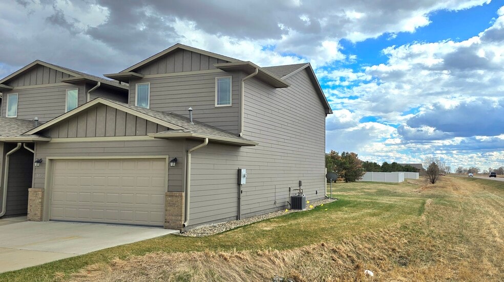 3/4 View of Town Home with Side Yard - 8413 W 53rd St
