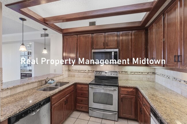 Building Photo - Charming Condo in Established Community of...