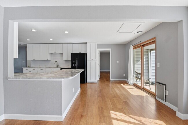 Building Photo - $3,045.95, 3 bed, 2 bath house in Denver with Fenced in Yard and In Unit Laundry!