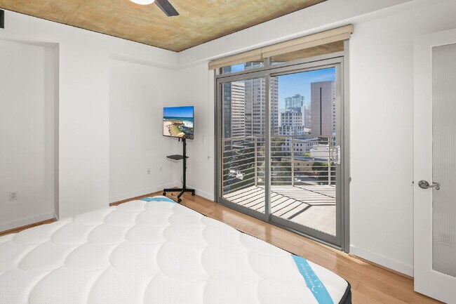 Building Photo - SPECTACULAR SKYLINE SANCTUARY | Unrivaled 1,480+ SF Terrace in Cortez Blu