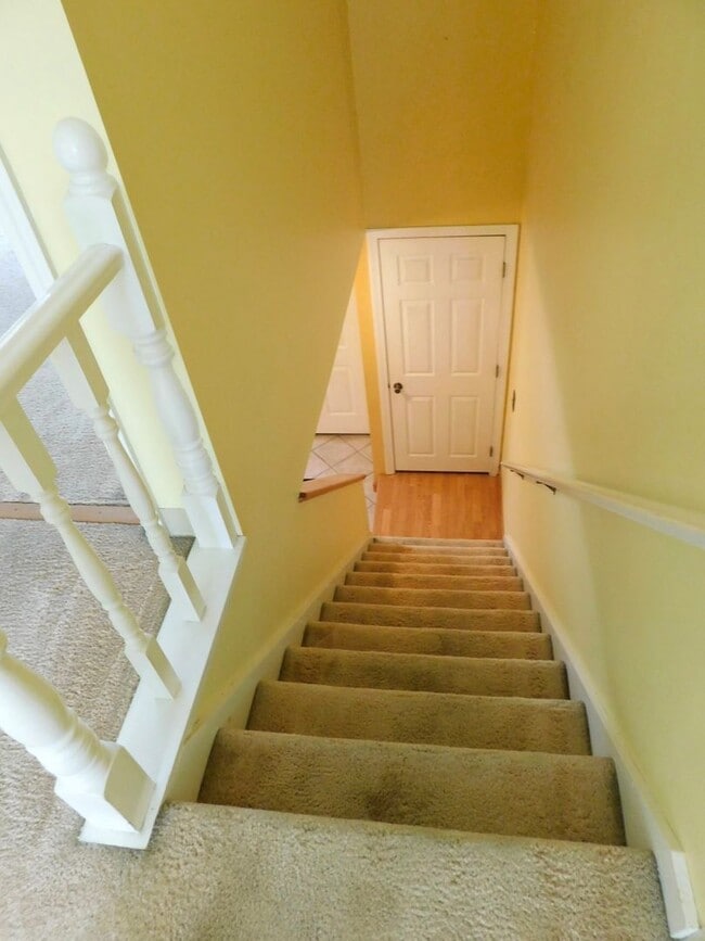 Building Photo - 3 Floor Condo Located In Country Setting -...