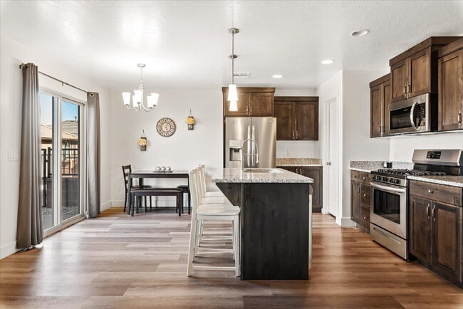 Building Photo - "Spacious 4-Bedroom Townhouse Retreat on S...