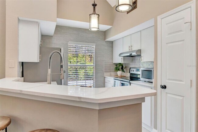 Building Photo - 9130 Lake Chase Island Way