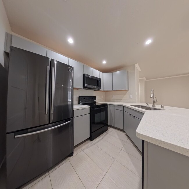 Building Photo - Highly Remodeled | Customer Closets | Gated Community