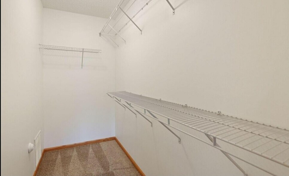 Walk in closet in master bedroom. - 8437 W 149th St