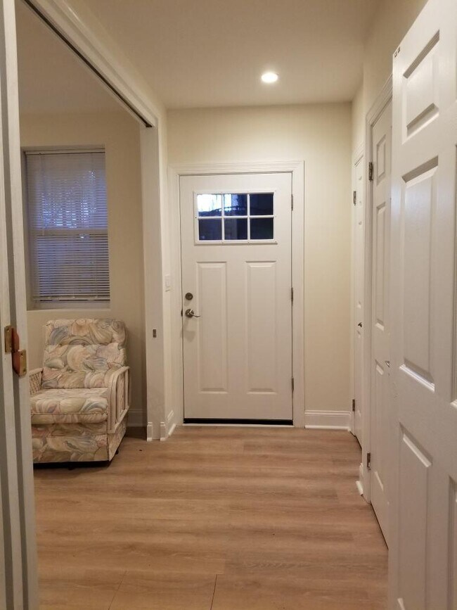 Front door from inside-partition wall shown at left that closes off front room. - 1632 5th St NW