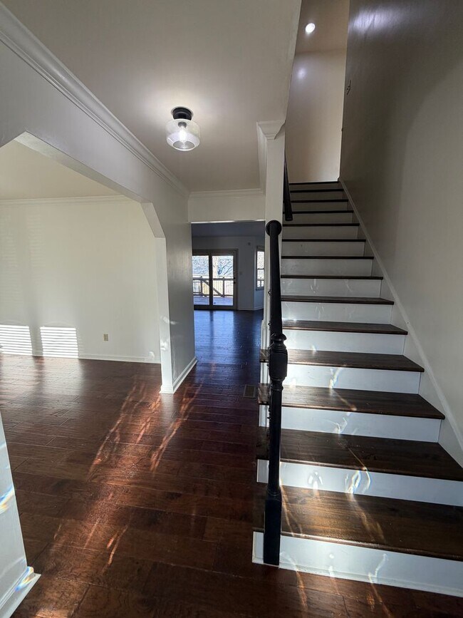 Building Photo - 4 Bedrooms with Finished Basement and Bonus Room!