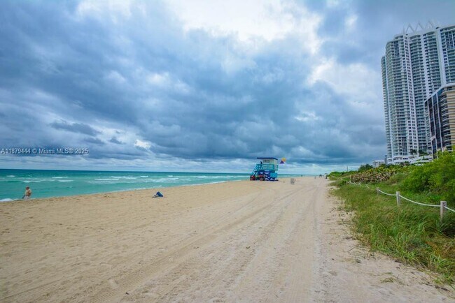 Building Photo - 6498 Collins Ave