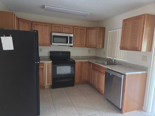 Building Photo - 4718 Leucadendra Dr