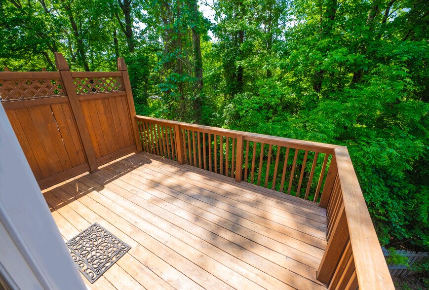 Private rear balcony facing the woods. Allows for grilling and more. - 2922 Duvalla Ave