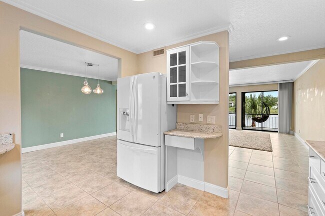 Building Photo - Lakefront lifestyle in this stunning 3-bed...