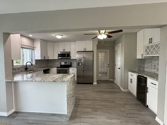 Building Photo - "Elegant 3-Bed Waterfront pool Home"