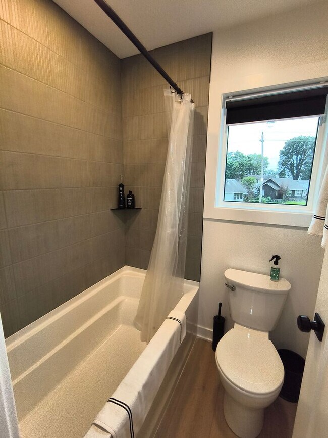 Building Photo - Modern 3-Bedroom Home Near Lake Manawa – Lake Views & Smart Home Features!