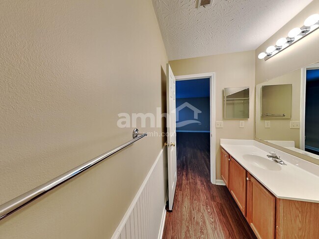 Building Photo - 6312 Satin Wood Dr