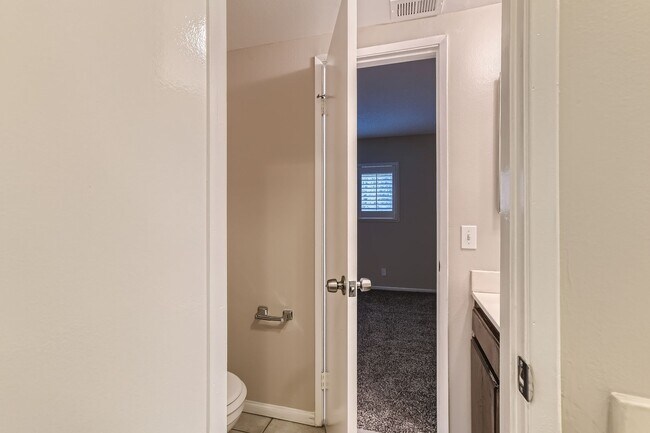 Building Photo - Freshly Updated 2-Bedroom Condo with Attached Garage in Gated Winnetka Community