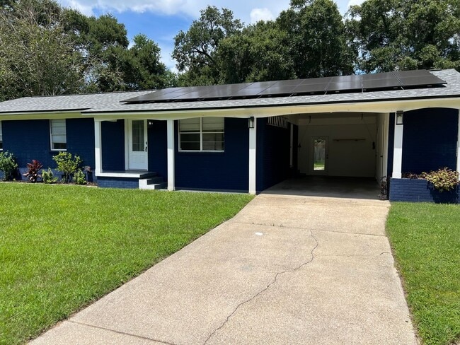 Building Photo - Updated 3BR | Solar Panels + Fenced Yard