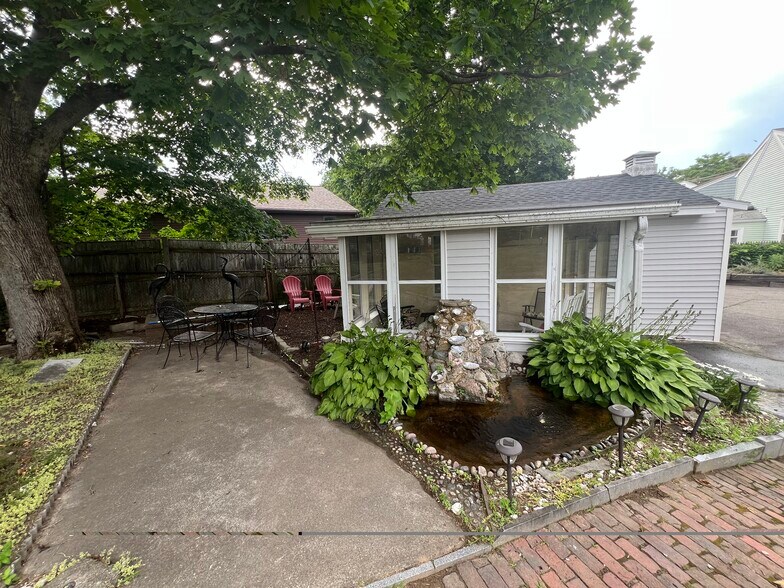 patio with fishpond - 265 Common St