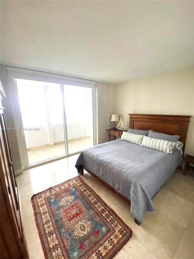 Building Photo - 10275 Collins Ave