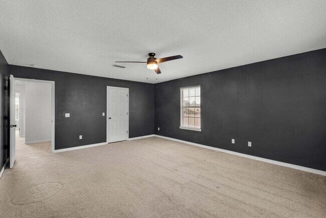 Building Photo - LAKE FRONT HOME & GATED COMMUNITY WITH COMMUNITY POOL IN NAVARRE!