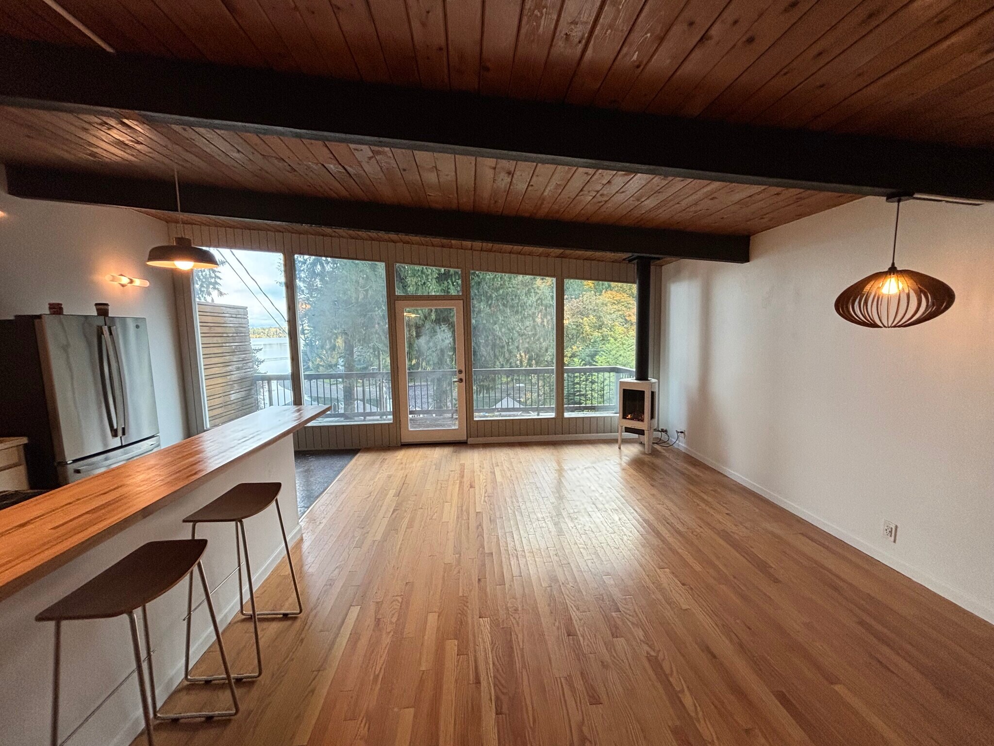 Living area, kitchen, and deck - 3323 Windolph Loop NW