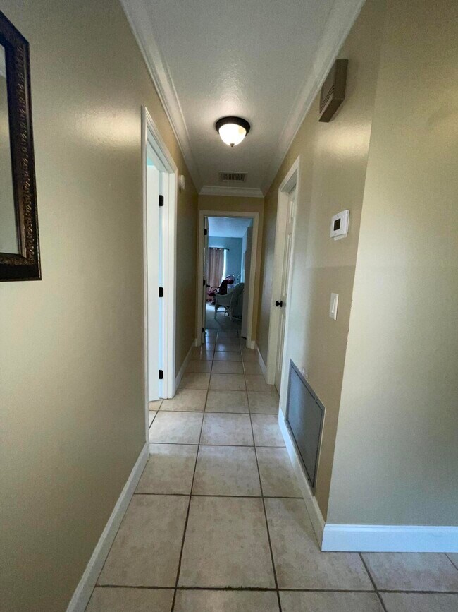 Building Photo - 2874 NE Rosetree Dr