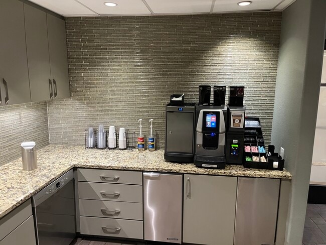 Coffee machine in the lobby makes lattes, espressos and everything in between - 330 Las Colinas Blvd E