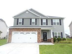 Building Photo - 4 Bedroom 2.5 Bathroom home located in Carolina Subdivision