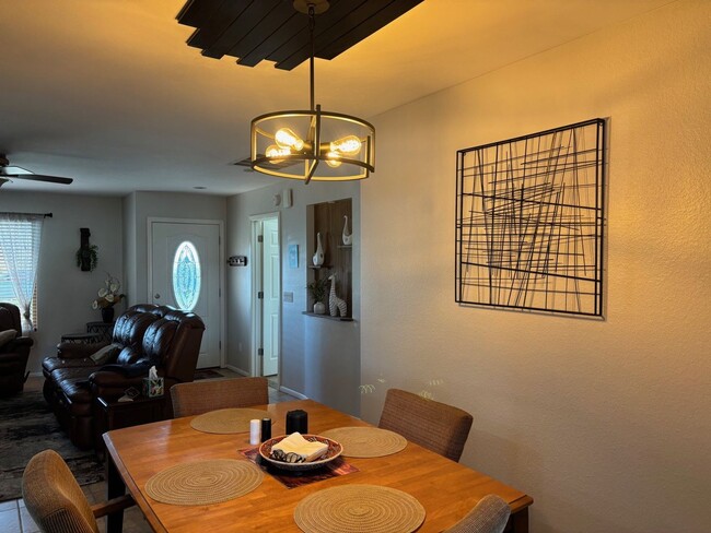 Building Photo - Welcome to this stunning updated 2-bedroom, 2-bathroom home on a lake located in the vibrant comm...