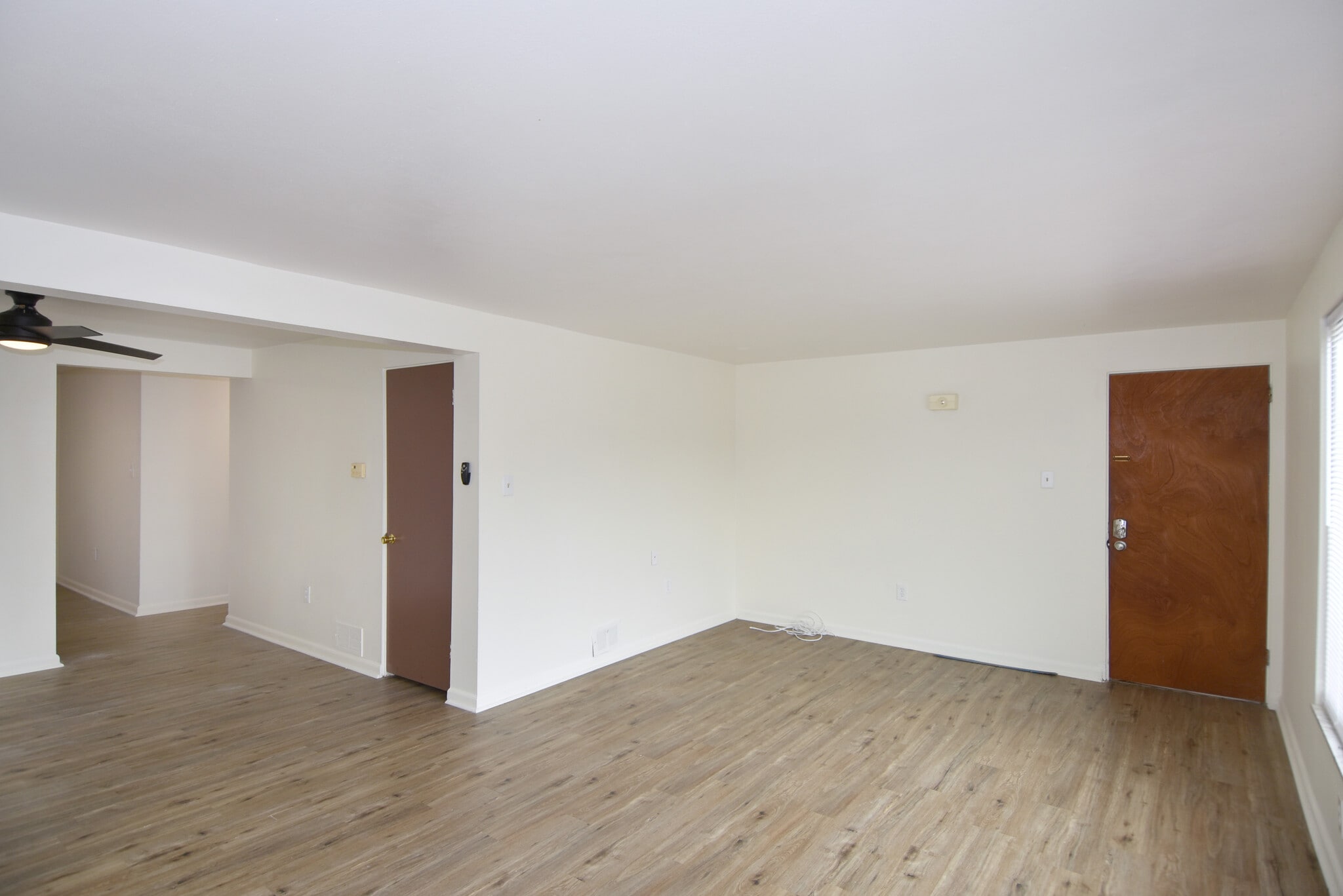Separate spacious & freshly painted living and dining rooms with luxury vinyl plank flooring through - 3156 Glendale Ave
