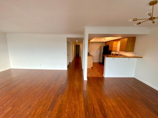 Building Photo - 1,300+ Sq Ft 2BR Condo w/ Parking, W/D & Utilities Included | $1,000 Move-In Credit