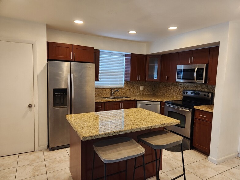 kitchen with granite countertop - 3345 Hayes St