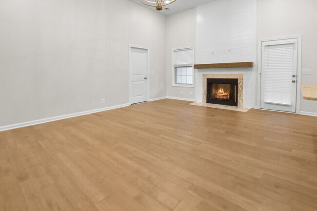 Building Photo - Like New Three Bedroom with Bonus!