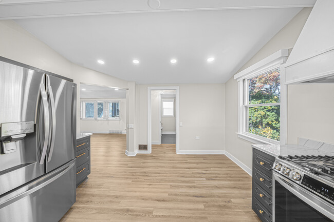 Kitchen facing bath/pantry/opening to Living Room - 633 Glenview Ave